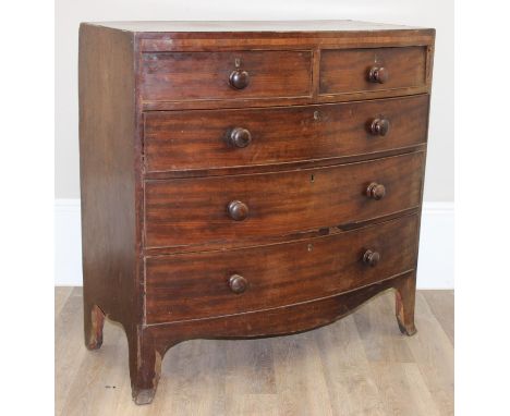 A Victorian mahogany 2 over 3 bow fronted chest of drawers with bun handles and bracket feet, 103cm x 51cm x 105cm