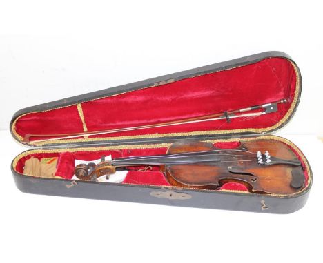 A vintage violin bearing Stradivarius label, label also with hand written annotation repaired by Dunn &amp; Davidson Edinburg