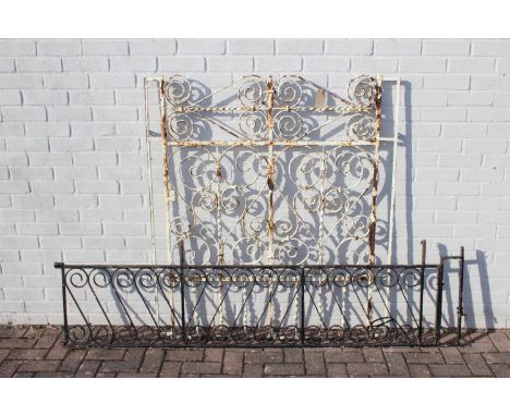 An antique or vintage wrought iron fencing panel or garden divider, distressed white paint, 122cm wide x 136cm tall and a pie