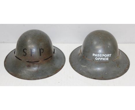 2 WW2 period Zuckerman helmets, made at the Press Steel in Oxford, one marked Passport Office, the other SFP [2]