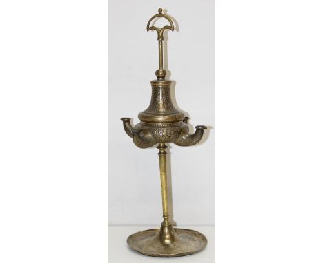 An unusual Anglo-Indian 4 branch brass oil lamp with embossed floral and scroll decoration, likely 19th century, 48cm tall
