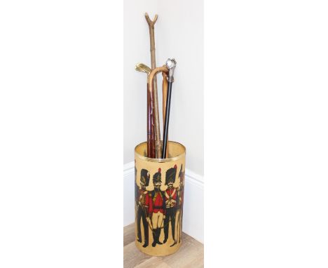 Vintage spun fibreglass stick stand decorated with soldiers with some walking sticks to incl carved wooden example, golf club