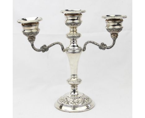 A silver 3 branch candelabra of 19th century form with embossed acanthus scrolls, Birmingham 1978 by Broadway &amp; Co, 24cm 