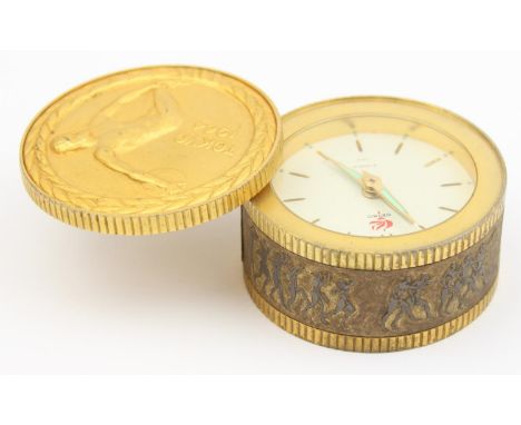 A rare 1964 Tokyo Olympics commemorative alarm clock by Seiko, model UB-525, 65mm in diameter when closed