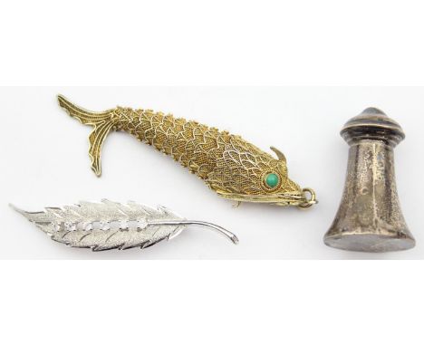 A Chinese silver gilt filigree pendant with opening mouth and turquoise eyes, a silver leaf brooch with white stones and a sm