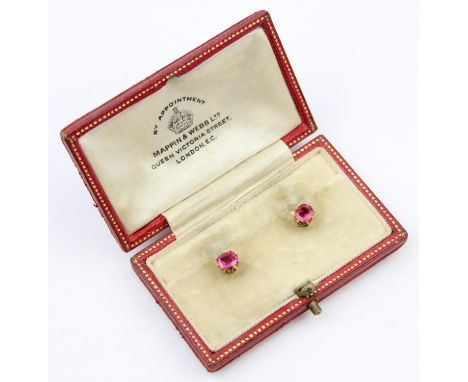 A pair of antique gold shirt buttons or studs by Mappin &amp; Webb, set with facet cut pink stones, possibly rubies, unmarked