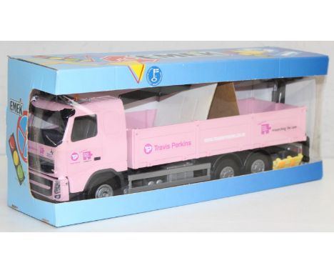 A rare Emek of Finland 1/25th scale Travis Perkins lorry with pink Breast Cancer supporting livery, boxed, approx 42cm wide