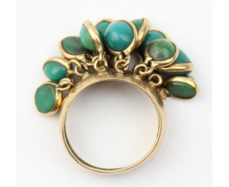 [5.27g, L] - a very unusual retro 18ct gold ring with a number of greenstone drops, likely jade or a turquoise, unusual movin