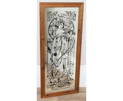An Art Nouveau style Moet &amp; Chandon advertising mirror with pine frame, 122cm x 53cm