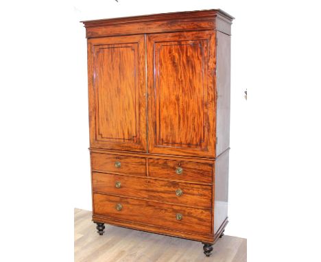 A 19th century mahogany linen press converted wardrobe with 2 over 2 chest of drawers base and turned bun feet, approx 135cm 