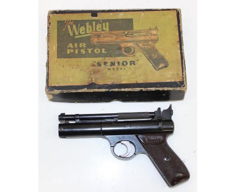 A vintage Webley Senior air pistol in original box with a box of Marksman .177 pellets 