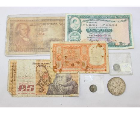 A small qty of mixed world vintage banknotes, a 1935 Rocking Horse crown coin, an 1889 Hong Kong 5 cents coin and a 1938 silv