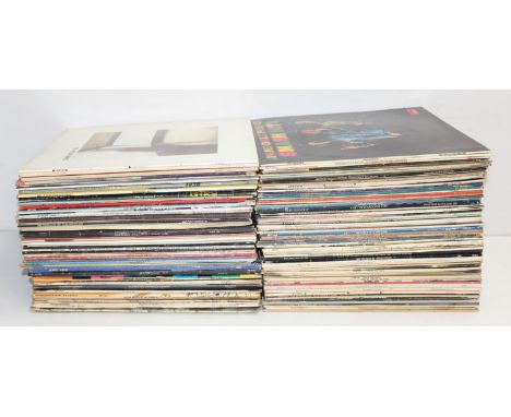 A large qty of assorted vinyl records, mainly LPs to include Paul McCartney, The Power Station, George Harrison, Grandmaster 