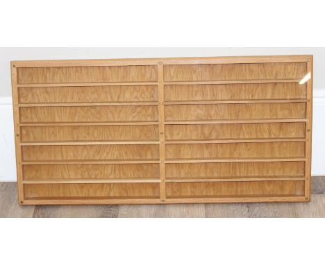 A modern light oak wall mounted display cabinet with removable Perspex front, ideal for toy cars or Lego figures etc, 105cm x