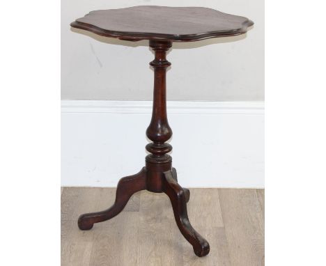 An antique mahogany tripod table with turned pillar and shaped top, approx 60cm x 60cm x 75cm