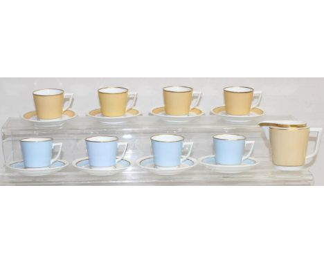 Two Royal Copenhagen part coffee sets, baby blue and camel coloured design with gilt edging, marks to base