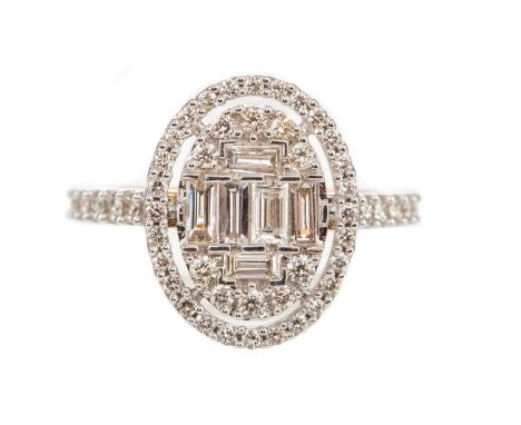 DIAMOND DRESS RING,set with round and baguette cut diamonds totalling approximately 1.00 carat, in nine carat white gold, siz