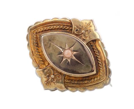 VICTORIAN MOURNING BROOCH,of marquise shape and set with a single pink stone, panel to the reverse, marked 15CT