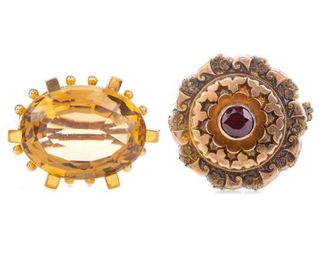 CITRINE BROOCH AND A MOURNING BROOCH,the mourning brooch set with a central red gem with panel to the reverse (2)