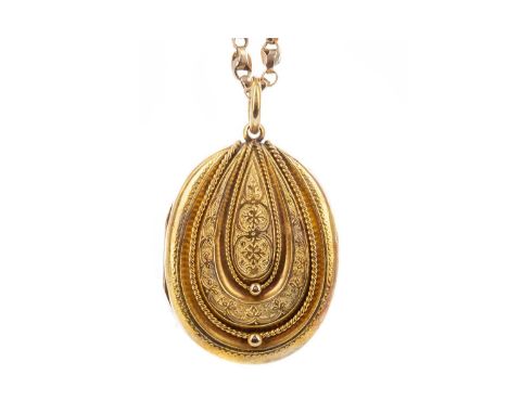 VICTORIAN OVAL LOCKET,on a nine carat gold belcher link chainLocket is not gold. scratches and minor dents to the locket, the