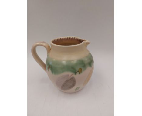 A Susie Cooper studio ceramic jug painted with chestnut motifs. Painted signature and No. M66.V. 17.5cm high 