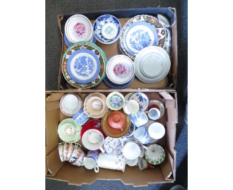 A box containing mostly assorted cups and saucers and a box of dinner plates, saucers and dishes, etc 