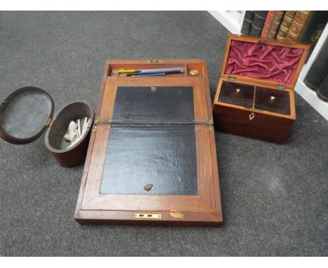 A Victorian  walnut desk writing box, a tea caddy and an oval trinket box (3) 