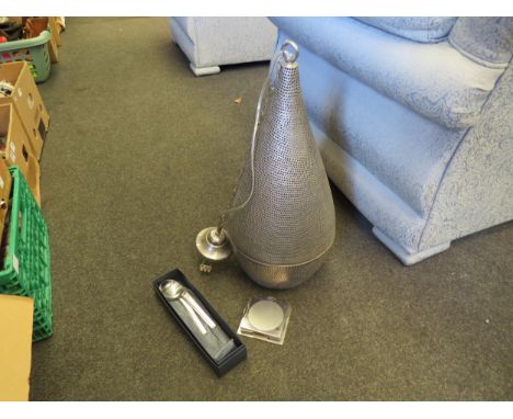 A set of four Georg jensen stainless steel spoons, a set of five coasters and a metal ceiling light with pierced design 