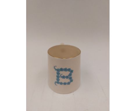 A Victorian Goss porcelain mug with initial "B" in Forget me Nots 