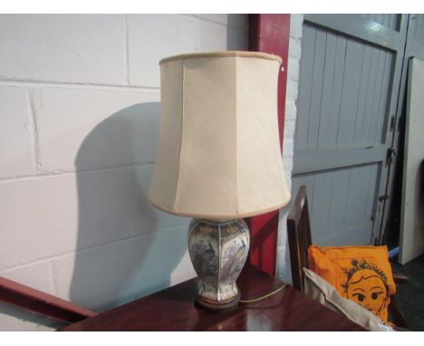 A modern ceramic table lamp with peacock decoration 