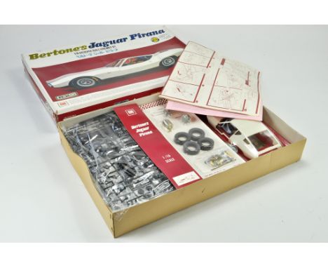 Otaki Plastic Model Kit comprising 1/16 Bertones Jaguar Pirana. Looks to be complete and unstarted hence excellent. Scarce.