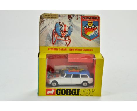Corgi No. 499 Citroen Safari Grenoble 1968 Winter Olympics in white, blue, silver trim, spun hubs, red rack with 2 x yellow s