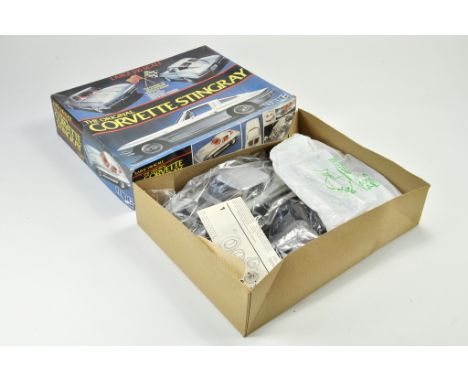 MPC Plastic Model Kit comprising 1/16 Corvette Stingray. Looks to be complete and unstarted hence excellent.