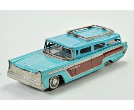KKK Nihon Boeki Japanese Friction Driven Tinplate Lincoln Country Squire Station Wagon. Some light deformation, otherwise bri