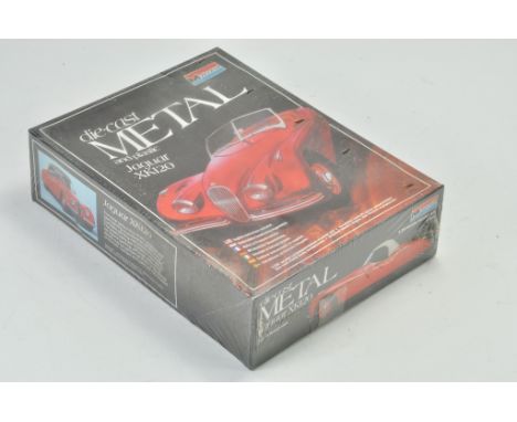 Monogram Plastic and Metal Model Kit comprising 1/24 Jaguar XK120. Looks to be complete, unstarted and sealed.