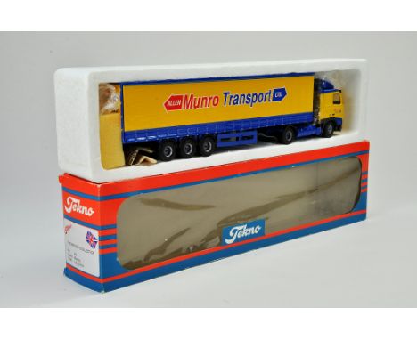 Tekno Model Truck Issue comprising no. Volvo Curtain Trailer in the livery of Munro Transport. Appears Generally Very Good to
