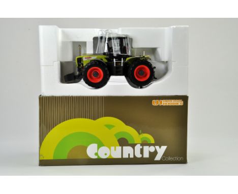 Universal Hobbies 1/32 Diecast Model Farm Issue comprising Claas Xerion 3300 Tractor, appears to be Generally Good with damag