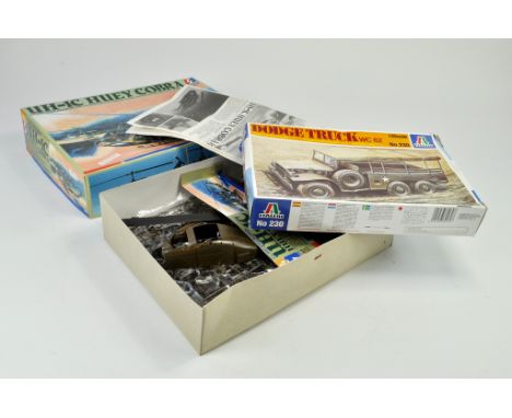 Duo of 1/35 Model Kits comprising Seminar UH-IC Huey Cobra US Army Attack Helicopter, plus Italeri  Dodge Truck WC62. Both ap
