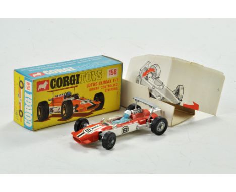 Corgi No. 158 Lotus Climax Formula 1 Racing Car in two-tone orange, white. Excellent with leaflet in excellent box, little or