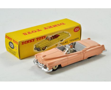 Dinky No. 131 Cadillac Eldorado Convertible with salmon pink body, light grey interior, original driver, beige steering wheel