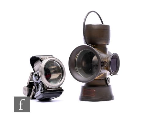 A Lucas King of the Road brass hand lamp with swing handle, height 28cm, and a Lucas Silver King cycle lamp and a glass dome 