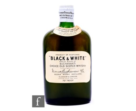 A bottle of 'Black &amp; White', special blend of Buchanan's scotch whisky, 1940s bottling, 70 proof, spring cap mechanism.