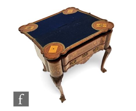 An 18th Century Dutch marquetry inlaid fold over card table, the top detailed with an urn of flowers and birds opening to rev