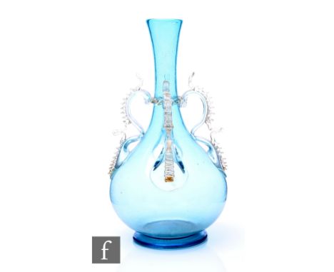 An early 20th Century Italian Murano glass vase in the manner of Salviati, the footed globe and shaft body in pale blue with 