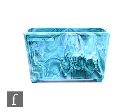 A 19th Century Sowerby pressed glass flower trough in the Old King Cole pattern to a marbled turquoise and white malachite gr