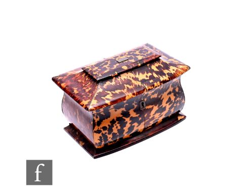A 19th Century tortoiseshell tea caddy, fitted two division interior enclosed by a pagoda top over a cushion form, width 19cm