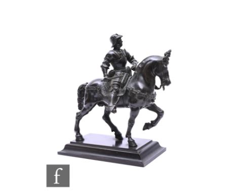 A late 19th century bronze model of a conquistador in full armour on horseback, on stepped plinth base, height 18cm.