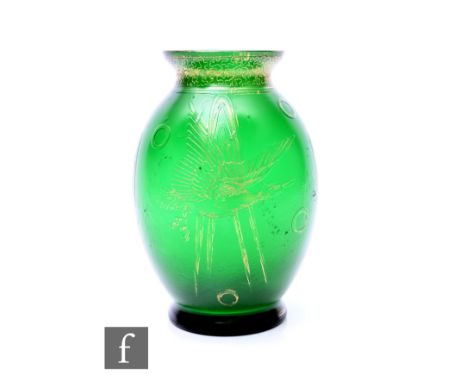 A late 19th to early 20th Century Loetz Creta vase of footed swollen ovoid form with everted rim, acid cut with a bird in fli