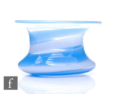 A later 20th Century&nbsp;Orrefors glass vase of waisted form with flared rim, decorated with spiral bands in blue and opal, 