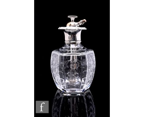 A mid 20th Century clear cut crystal glass scent atomizer by Webb Corbett, of hexagonal form with repeat panels of polished i